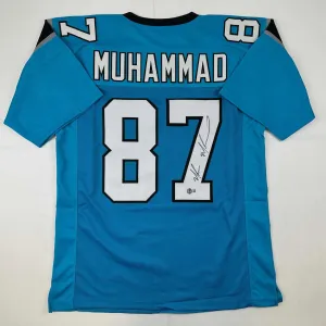 Autographed/Signed Muhsin Muhammad Carolina Blue Football Jersey Beckett BAS COA
