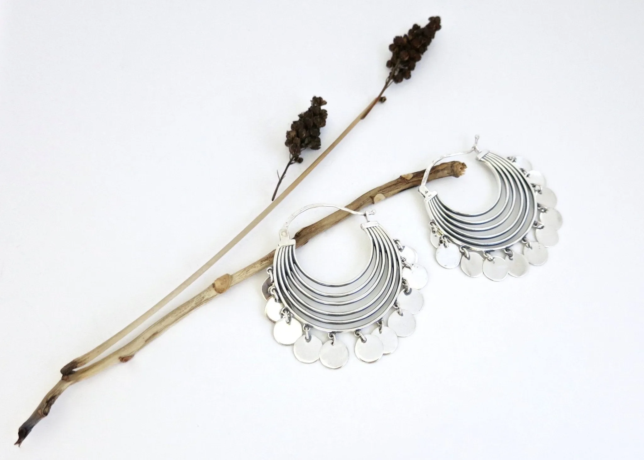 BINAH shimmering concentric arcs hoops